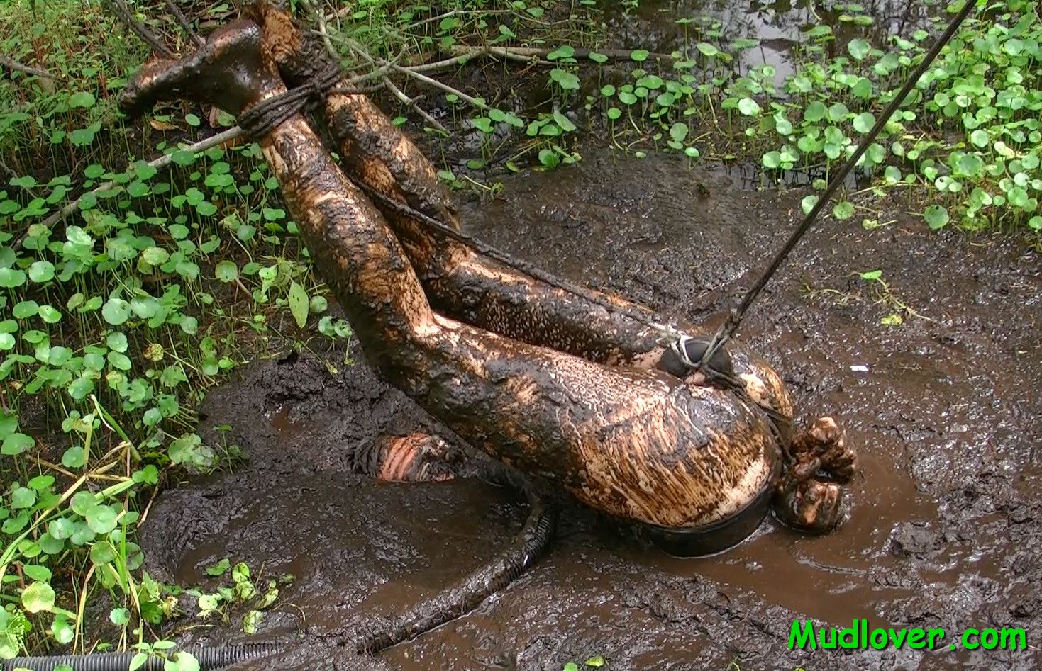 Bondage in the mud