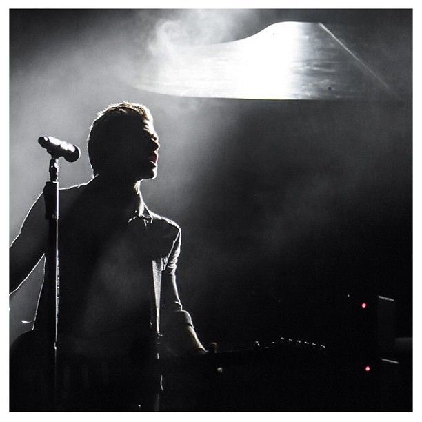 A singer in a smoky room