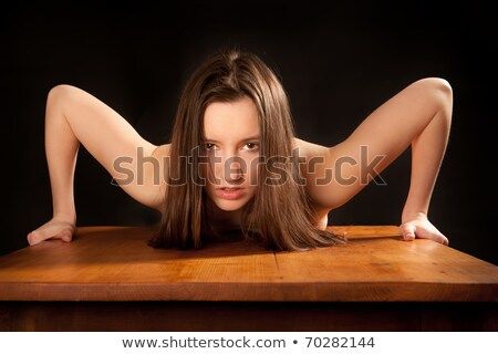 Beautiful nude women bent over