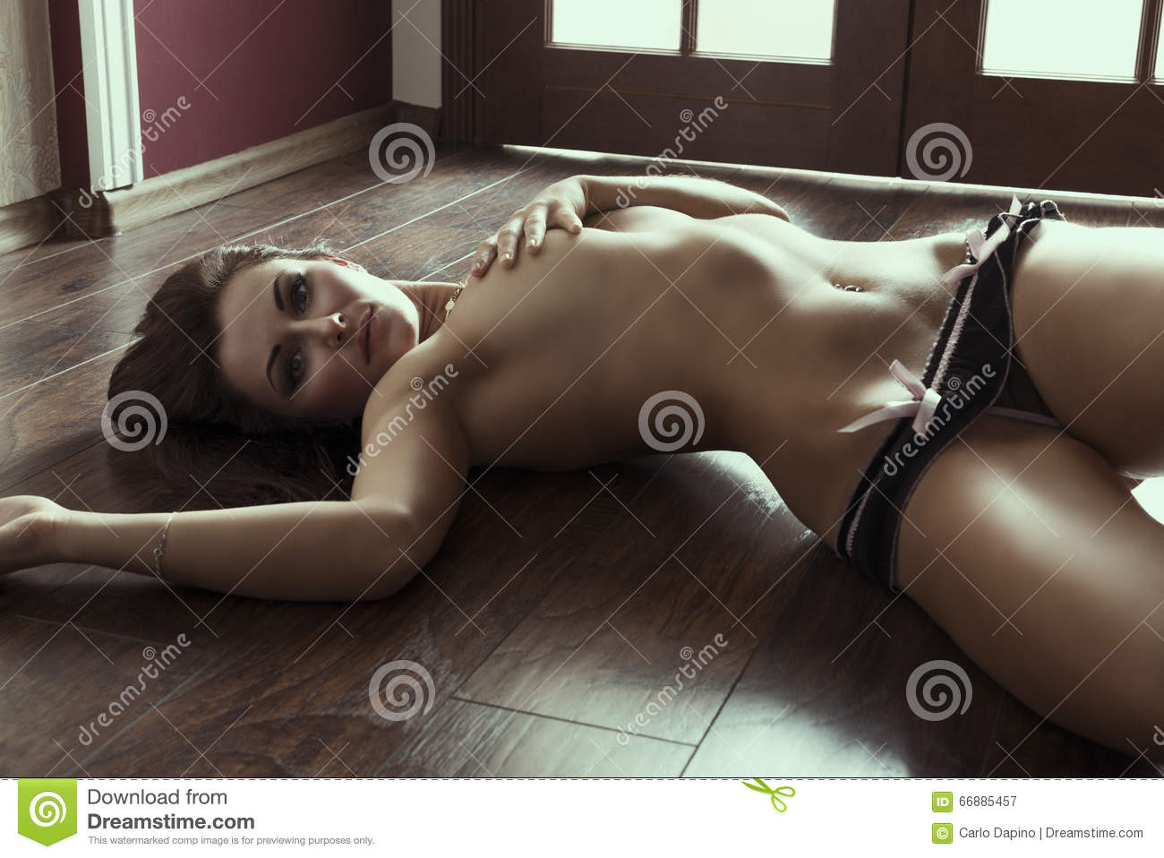 Cute girl nude on floor