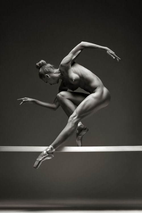 Naked girl on balance beam